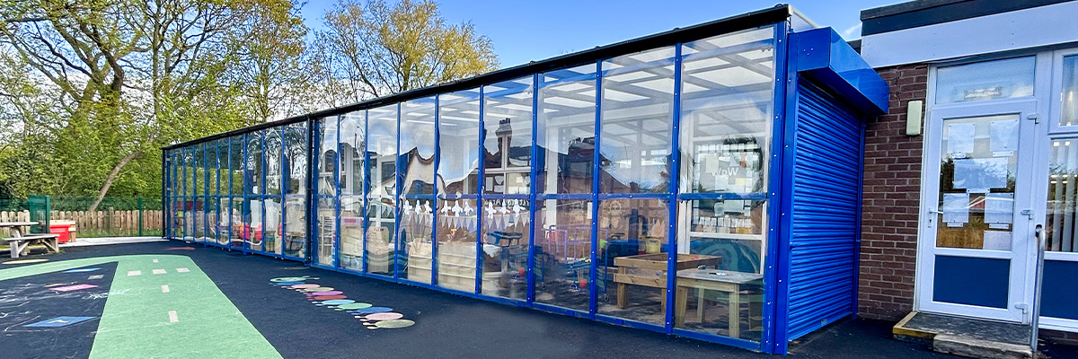 ROLLER SHUTTER CANOPIES TRANSFORM EYFS OUTDOOR PROVISION AT LANCASHIRE PRIMARY SCHOOL